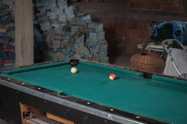 istock Billiards balls and cue on billiards table. Billiard sport concept 1168388443