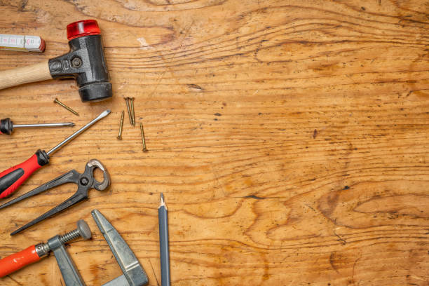 istock Woodworking tools on a wooden background with copy space 1168397796