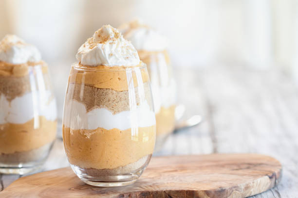 istock Pumpkin trifle dessert with whipped cream 1168401612