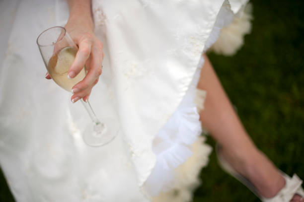 istock Wedding celebration holding a glass of Champaign 1168406057