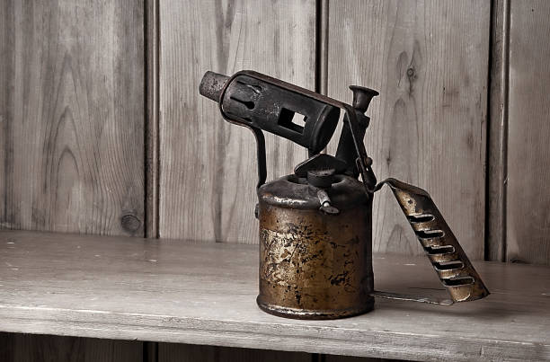 istock Old fashioned traditional brass blow torch 1168406292