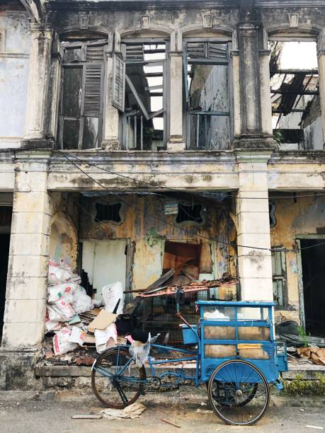 istock Rickshaw in front of derelict building, George Town in Penang 1168407715