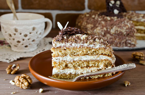 istock Honey cake with walnuts and grated chocolate 1168411576