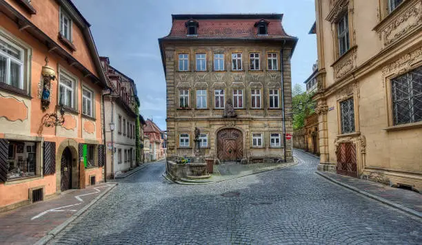 Street with historical buildings in the old center of Bamberg, Germany