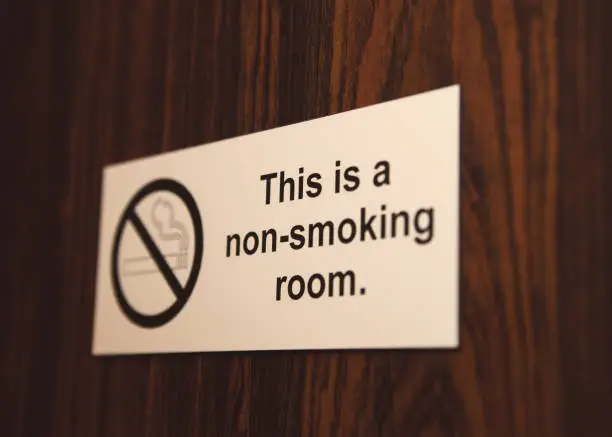 This is a non-smoking room sign on the door