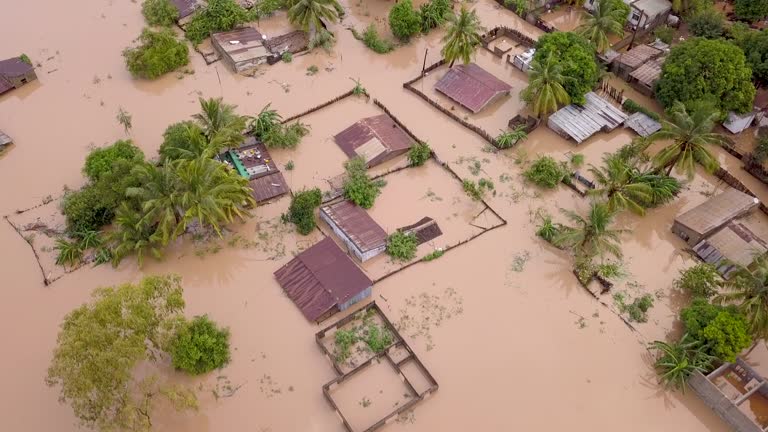 Aerial overhead flooded village in rural country