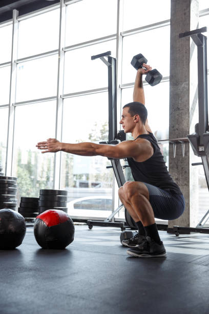 istock A muscular male athlete doing workout at the gym 1168414548