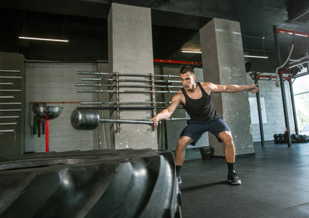 istock A muscular male athlete doing workout at the gym 1168414614
