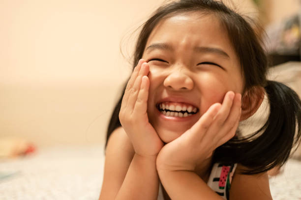 istock Laughing little girl 1168414644
