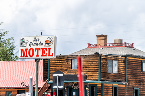 Monte Vista, USA - June 20, 2019: Highway 160 in Colorado with downtown city and sign for Rio Grande Motel hotel building