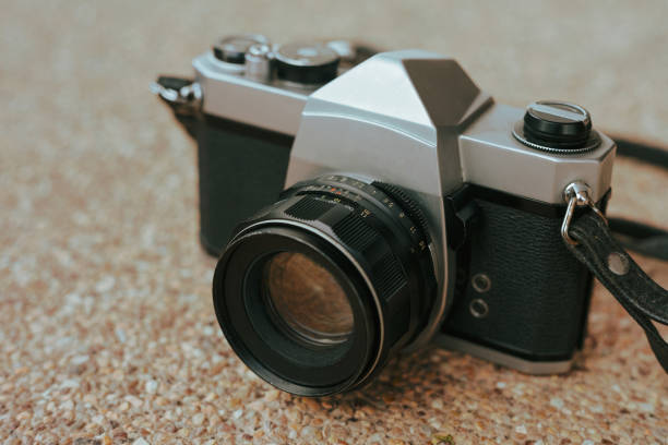 istock Old vintage film camera isolated. 1168417402