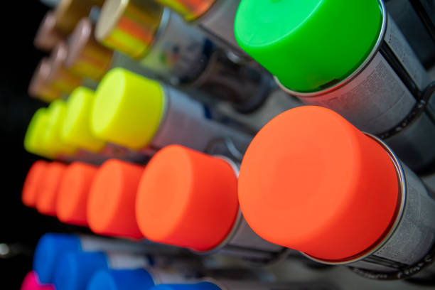 istock Fluorescent colors spray paints in art store shelf. 1168422386