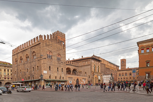 Bologna, Italy - April 03 2019: The Palazzo Re Enzo is a palace in the old town opposite the  Fountain of Neptune. It takes its name from Enzio of Sardinia, Frederick II's son, who was prisoner here from 1249 until his death in 1272.