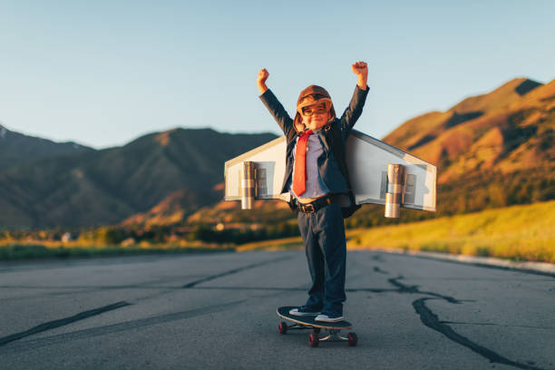 istock Young Boy Businessman Flying with Jet Pack on Skateboard 1168426310