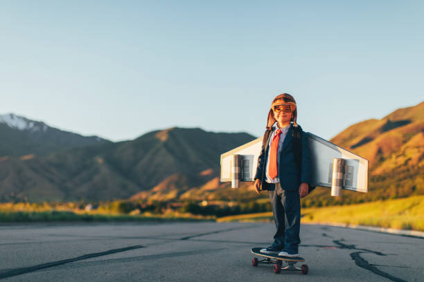 istock Young Boy Businessman Flying with Jet Pack on Skateboard 1168426315