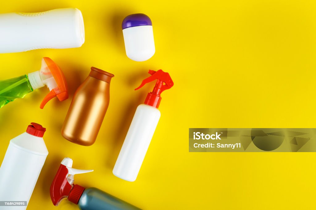 many different detergents set on a bright background. place for text. many different detergents set on a bright background. place for text. view from above Advertisement Stock Photo