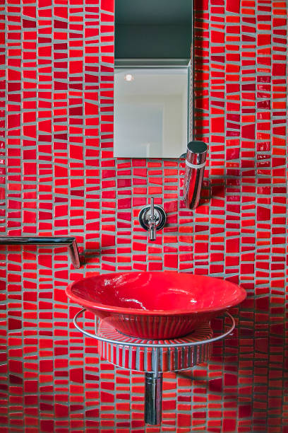 istock in the foreground the red ceramic washbasin suspended with red mosaic coating 1168430471