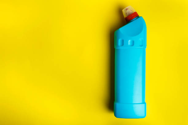 detergent bottle on bright yellow background. detergent bottle on bright yellow background. place for text shanghai cooperation organization stock pictures, royalty-free photos & images