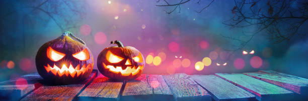 istock Jack O' Lanterns Glowing In Fantasy Night 1168430806