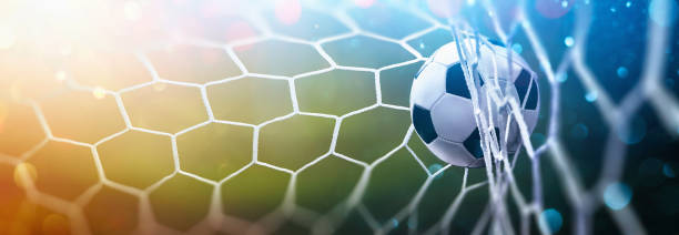 istock Soccer Ball in Goal. Multicolor Background 1168430811