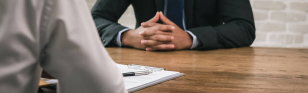 istock Businessmen having meeting for bribery and corruption 1168430875