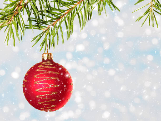 istock Fir tree branch with red toy, snowflakes. Winter holidays concept 1168431127