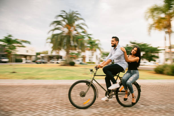 istock Couple riding bicycles in Mexico 1168432200