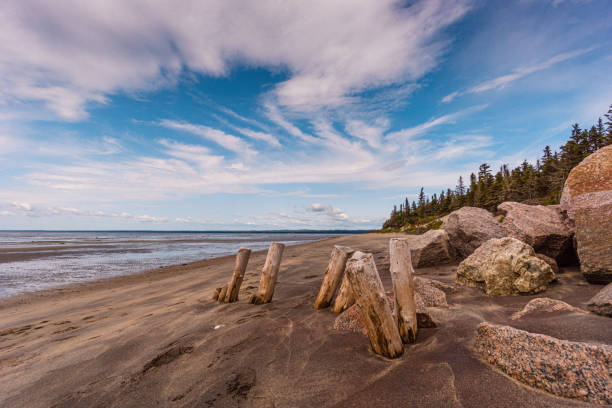 A look at the beach of Pointe aux Outardes, meaning Bustard Bay, situated in Côte-Nord Manicouagan Peninsula. Quebec travel photography. cote nord photos stock pictures, royalty-free photos & images