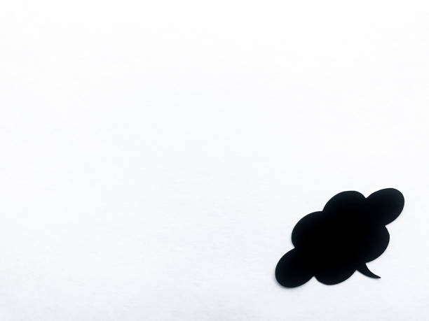 Black cloud speech in the lower right corner, white textured paper background