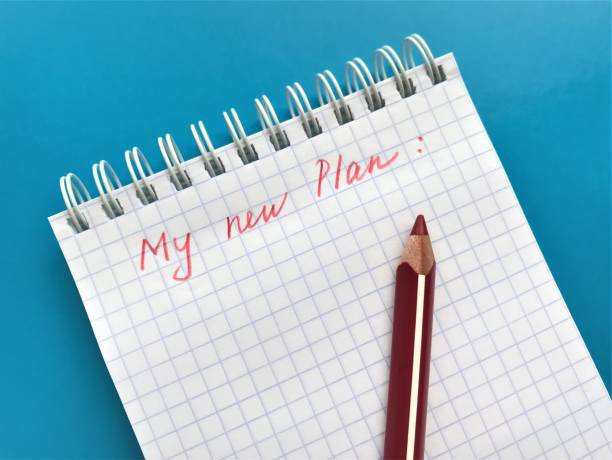 istock In a spiral notebook in a cage in red pencil is written 