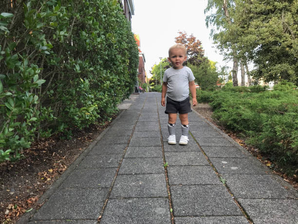 Cute walking  little toddler boy