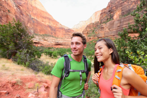 istock Hiking people - hiker couple on hike 1168437187
