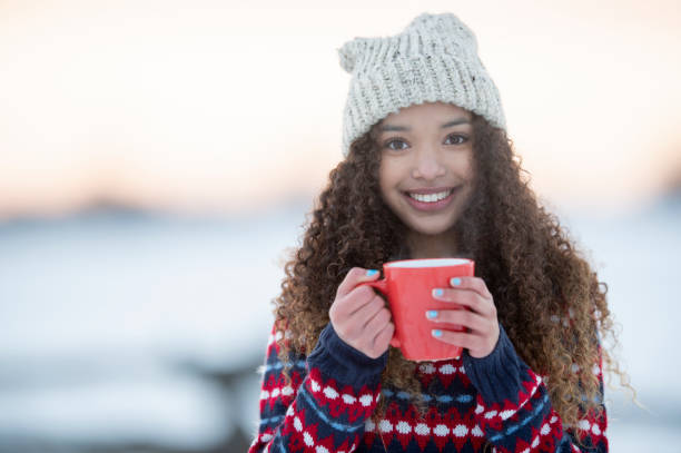 istock Beautiful young winter woman 1168437271