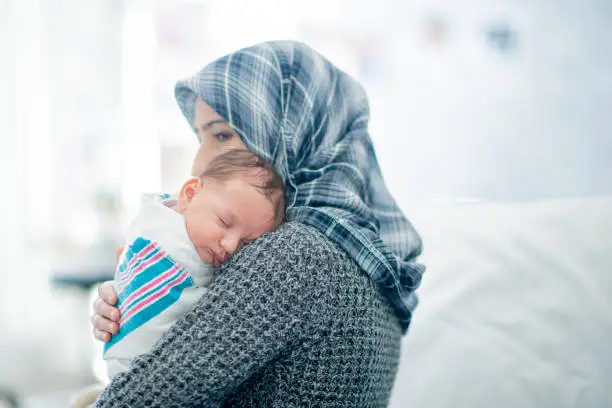 Photo of Muslim mother and baby