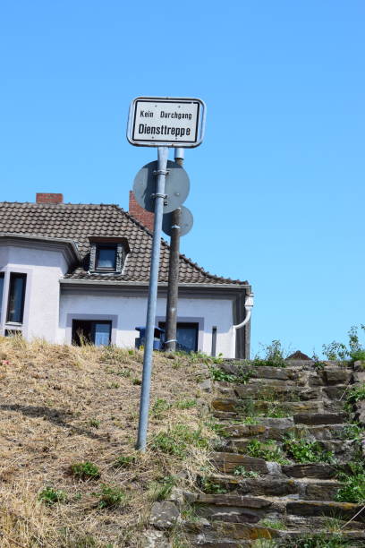 istock flood barrier stairway with warning sign 1168439163