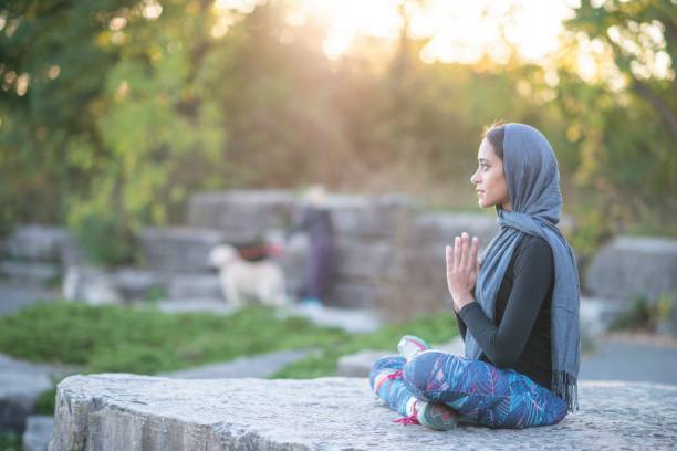 istock Muslim woman meditating 1168439602