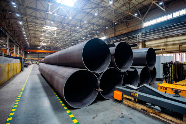 istock Black steel pipes in warehouse 1168441893