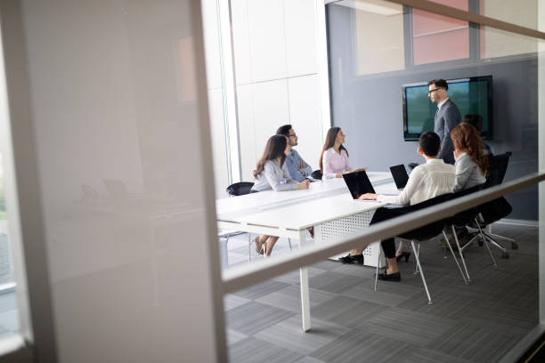istock Group of architects and business people working together 1168445854