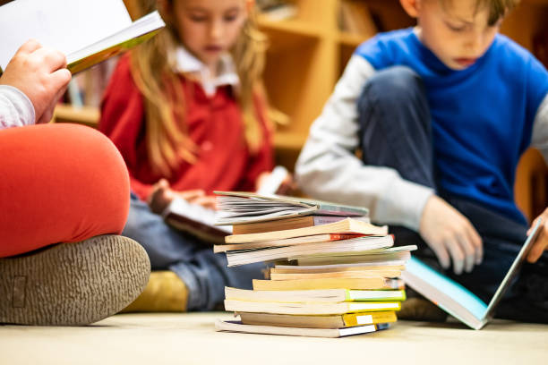 istock Close up school books on the floor 1168445910