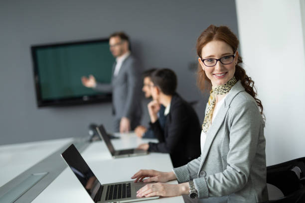 istock Group of business people collaborating in office 1168446084