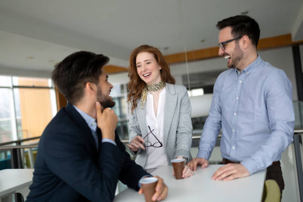 istock Business colleagues having conversation during coffee break 1168446823