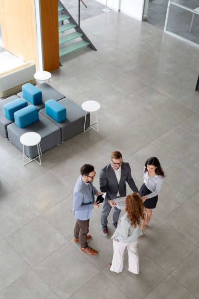 istock Business colleagues having conversation during coffee break 1168446918