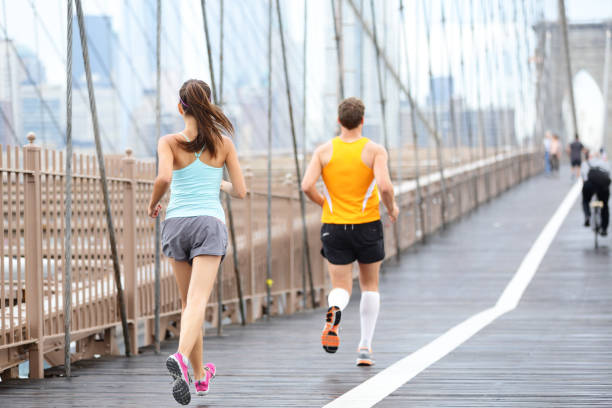 istock Running people jogging in New York City 1168447957