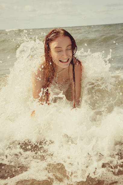 istock woman at sea 1168449284