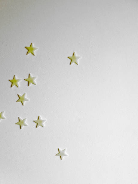 istock Star stickers plastered on the wall background texture, space for text 1168452566