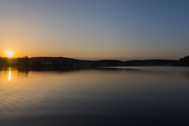 istock sunrise over the lake on a summer day 1168455456