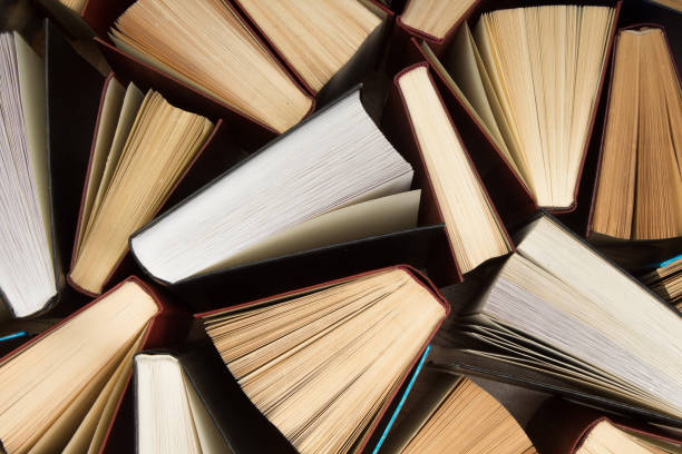 istock Background from old and used hardback books. Copy space for text. 1168456262