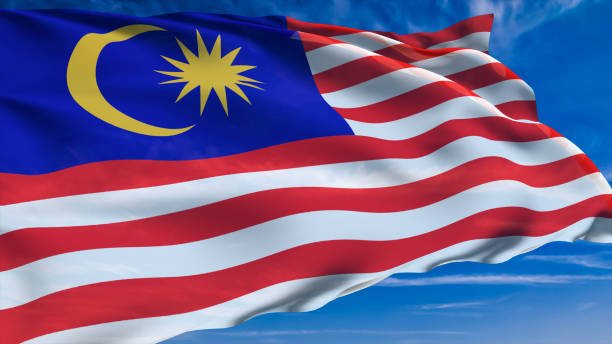 istock Flag of Malaysia with fabric structure against a cloudy sky 1168456439
