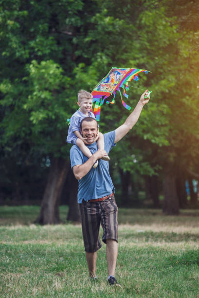 istock Single father and son hanging out outdoors 1168457501