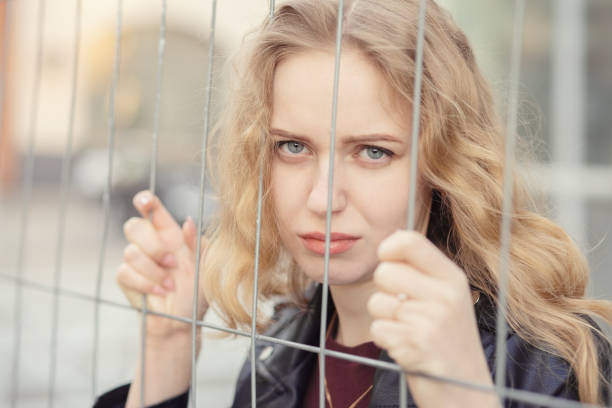 istock young woman prisoner 1168460470